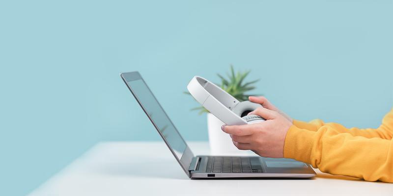 Illustrative picture of a lap top and head set