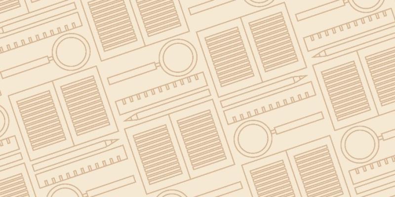 Magnifying glass, ruler, pen, and a publication. Picture: Anne Haapanen